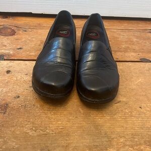 Dansko PIA Black Loafers with Slip-On Design and Wedge Sole